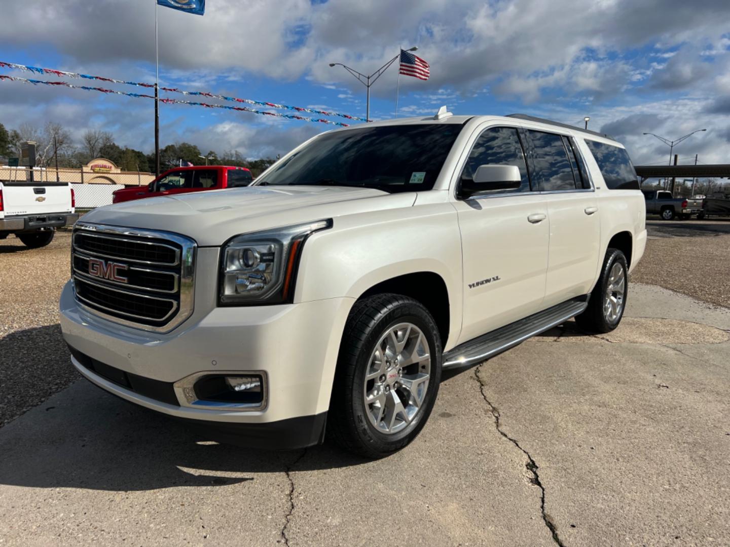 2015 W. Diamond /Tan GMC Yukon XL SLT (1GKS1HKC4FR) with an 5.3L V8 engine, Automatic transmission, located at 4520 Airline Hwy, Baton Rouge, LA, 70805, (225) 357-1497, 30.509325, -91.145432 - 2015 GMC Yukon XL SLT 5.3 V8 Gas, 156K Miles, All Power, Heated & Cooled Leather Seats, Sunroof, Dual DVD, 7 Passenger Seating, Tow Pkg. NO IN HOUSE FINANCING. FOR INFO PLEASE CONTACT JEFF AT 225 357-1497 CHECK OUT OUR A+ RATING WITH THE BETTER BUSINESS BUREAU WE HAVE BEEN A FAMILY OWNED AND OPERATE - Photo#0